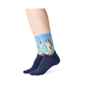 Lifestyle shot showing the socks on a person's legs, against a green background.