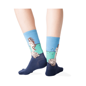 Back view lifestyle shot of a person wearing the socks against a dark grey background.