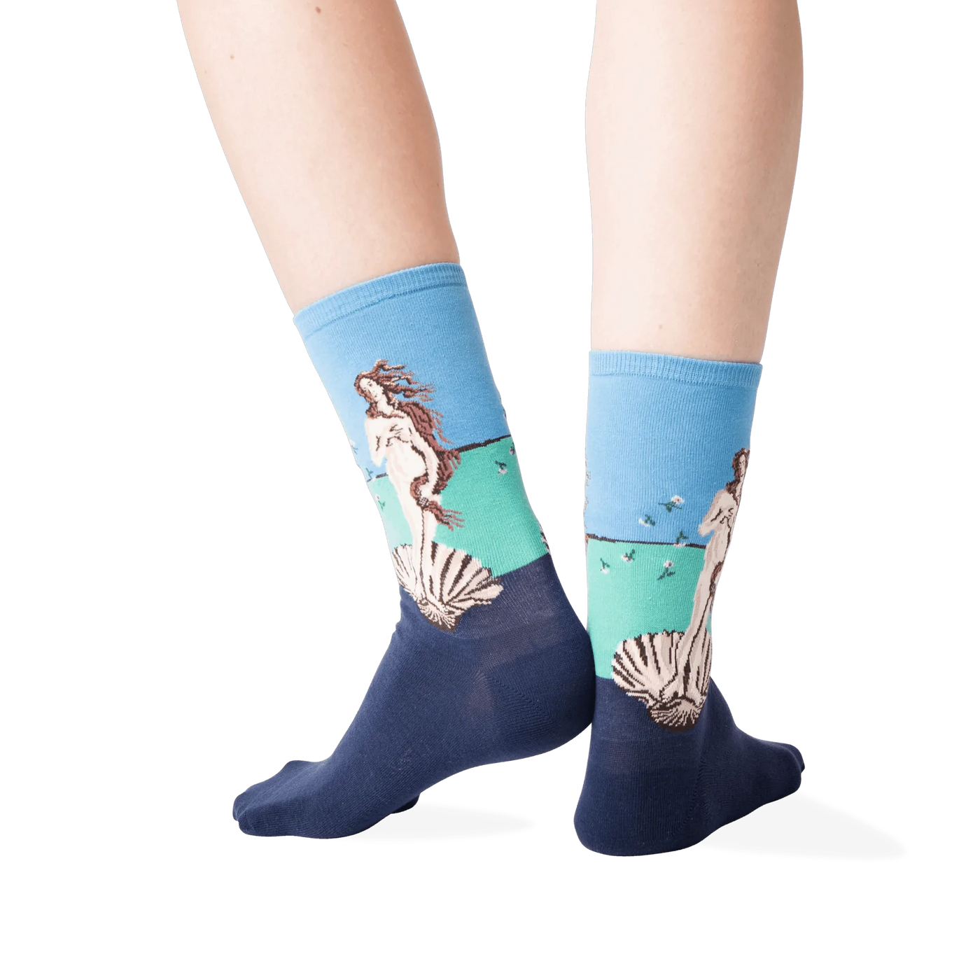 Back view lifestyle shot of a person wearing the socks against a dark grey background.