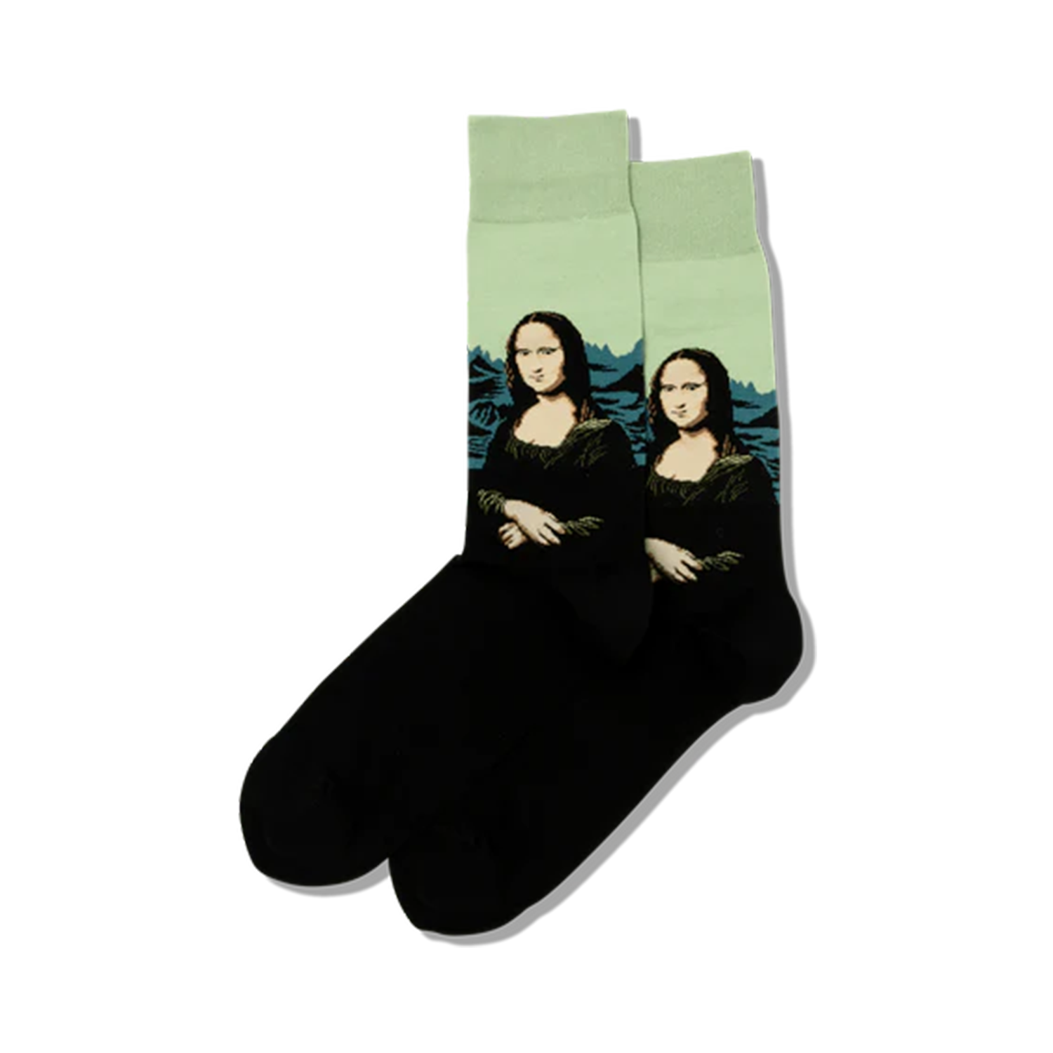 Lifestyle shot showing a pair of black crew socks with the Mona Lisa image on a mint green background.