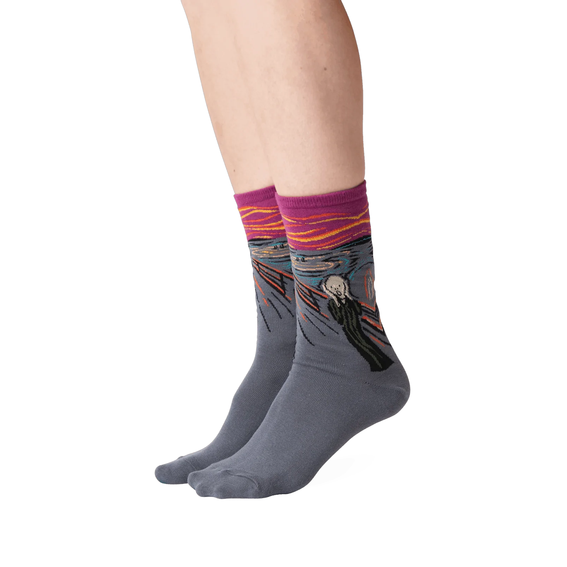 The Scream socks shown on a person's legs against a black background.