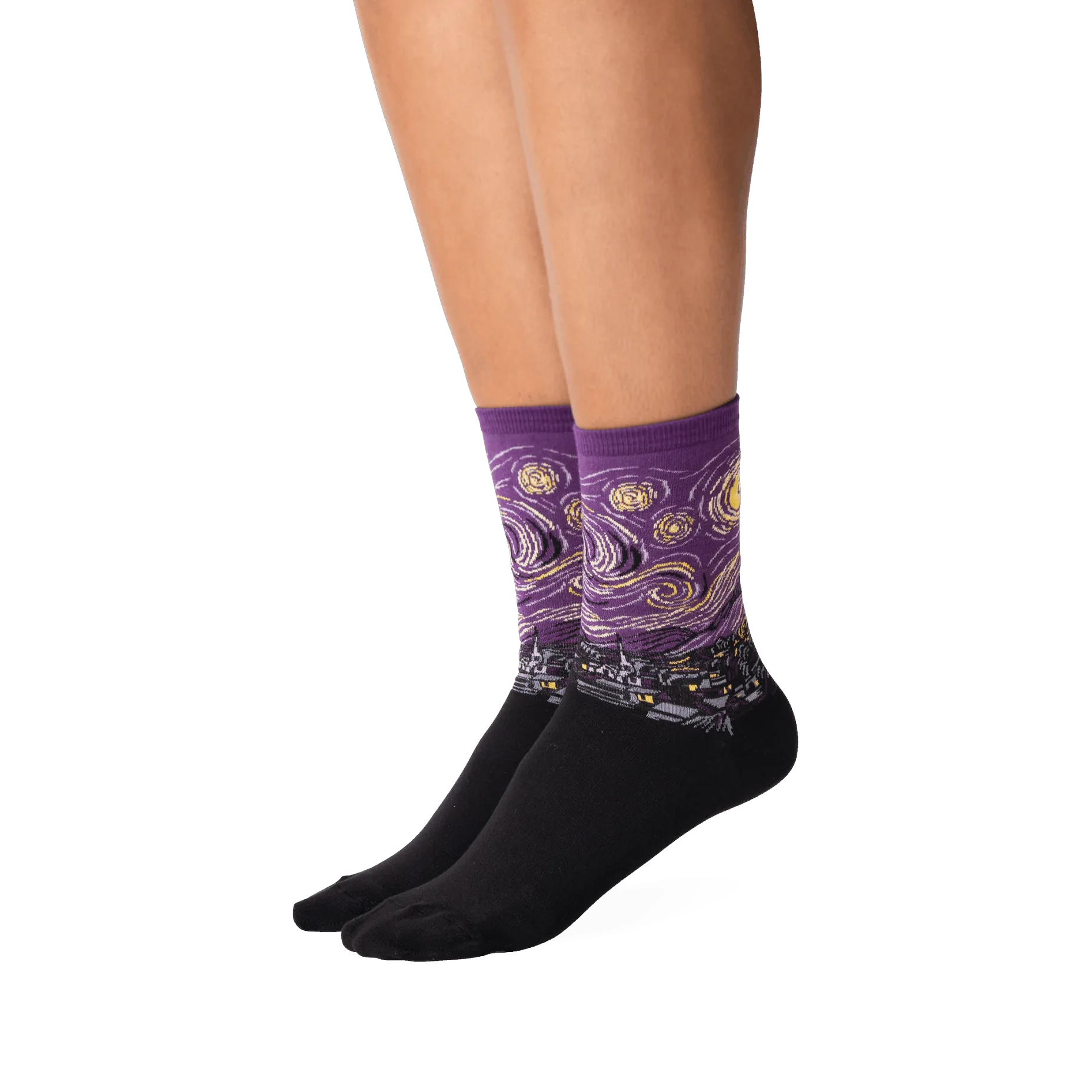 Lifestyle shot: A person's legs wearing a pair of purple Van Gogh's Starry Night socks.