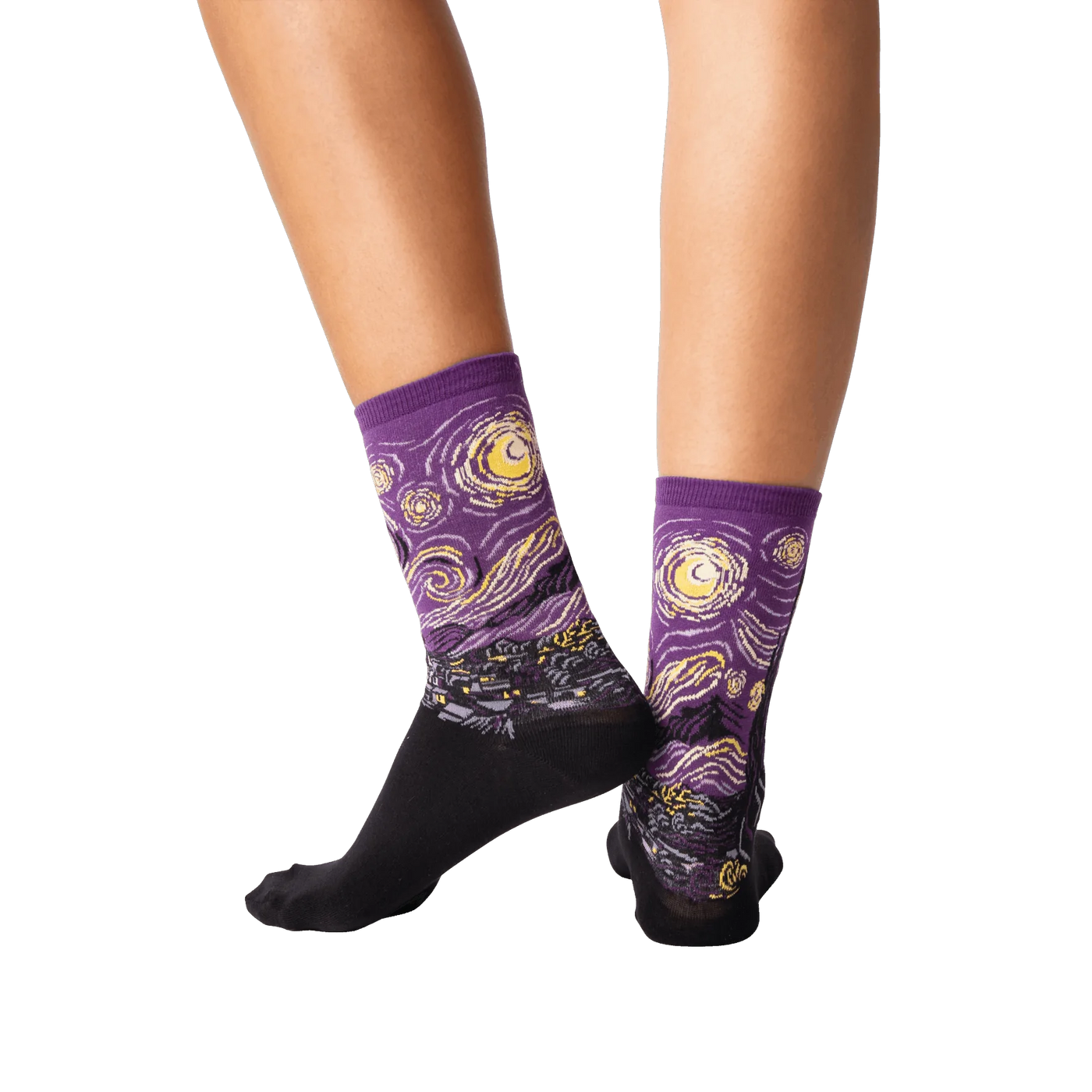 Back view of a person wearing purple Van Gogh's Starry Night socks, showcasing the sock's fit and design.