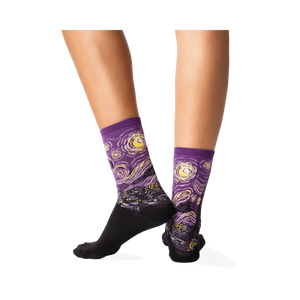 Back view of a person wearing purple Van Gogh's Starry Night socks, showcasing the sock's fit and design.
