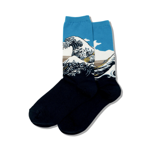 Pair of crew socks showcasing Hokusai's Great Wave.  Features blues, whites, and blacks;  wave design dominates the upper portion.
