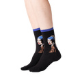 Lifestyle shot of a person wearing the 'Girl With A Pearl Earring' socks, showcasing how they look on the feet.