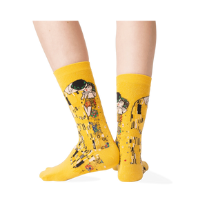 Back view of a person wearing Klimt's The Kiss socks, highlighting the back of the design.