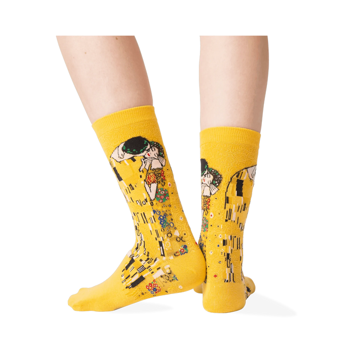 Back view of a person wearing Klimt's The Kiss socks, highlighting the back of the design.
