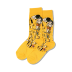 Pair of yellow crew socks featuring Gustav Klimt's The Kiss artwork.  Multicolored details on a mustard yellow background.