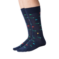 Lifestyle shot of Golf Navy socks on a model's legs, showing how the socks look when worn.