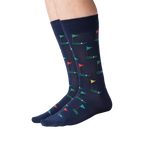 Lifestyle shot of Golf Navy socks on a model's legs, showing how the socks look when worn.