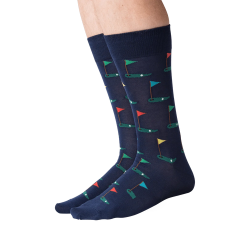 Lifestyle shot of Golf Navy socks on a model's legs, showing how the socks look when worn.