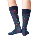 Back view of Golf Navy socks on a model's legs, showcasing the full pattern from a different angle.
