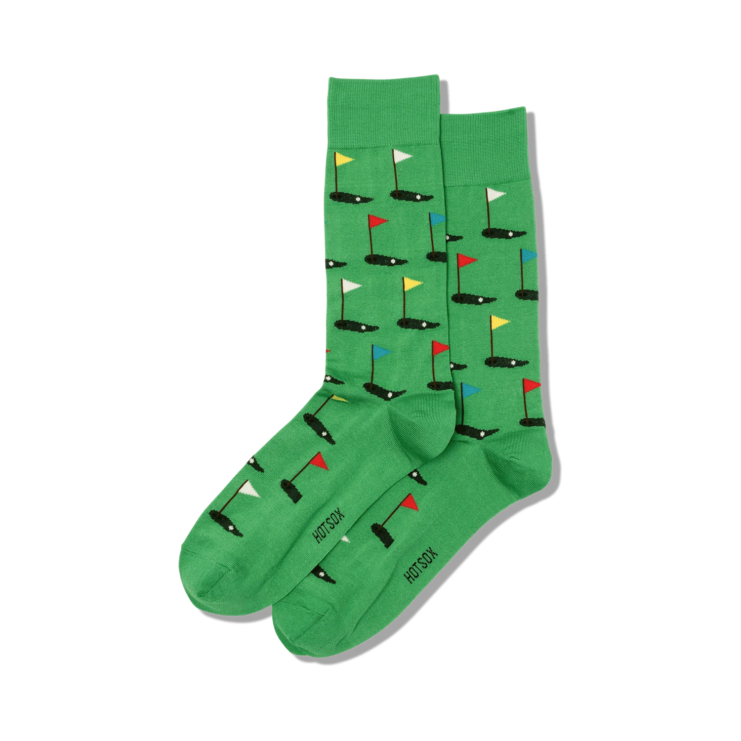 Pair of green crew socks with a repeating pattern of miniature golf holes and flags in red, yellow, blue, and white.