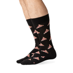 Lifestyle shot of a person wearing black pizza socks, showing the socks from the knees down.