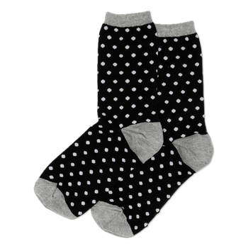 Pair of black crew socks with small white polka dots. Grey cuffs, heels, and toes are visible.