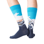 Flatlay photo of a pair of Hokusai's Great Wave socks, emphasizing the detailed design and color.