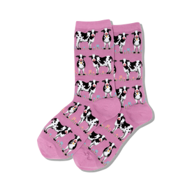 women's pink cow-patterned crew socks with green stems and colorful flowers.    