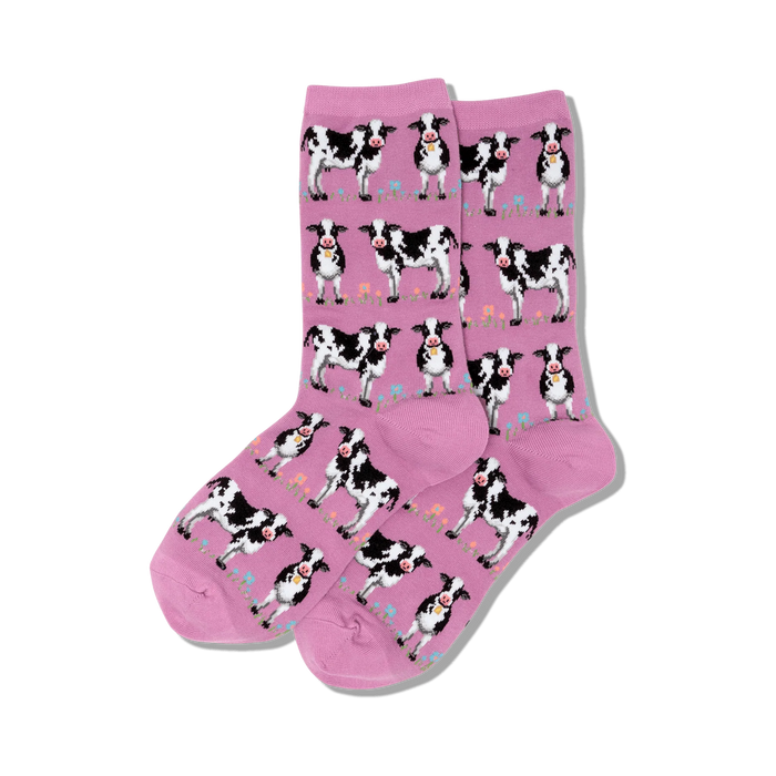 women's pink cow-patterned crew socks with green stems and colorful flowers.     }}