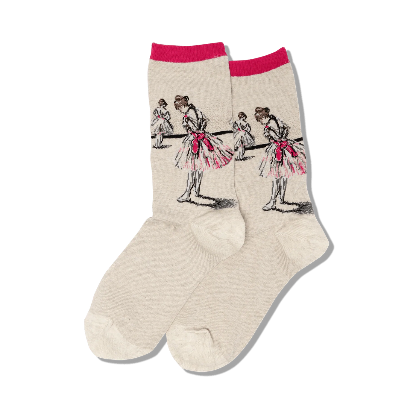 Close-up of a pair of beige crew socks with a pink top band, showcasing the detailed ballerina artwork.