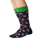 Lifestyle shot showing the Pirate Skull socks on a person's legs.