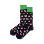 Pair of navy blue crew socks with a repeating pattern of red pirate skulls and crossbones. Green top trim.