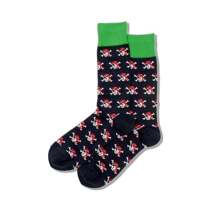 black mens crew socks with a repeated pattern of red pirate skulls with black eye patches and green hats. green toes and heels.   