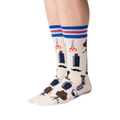 Lifestyle shot of a person wearing the Barber Shop socks, showcasing the fit and design.