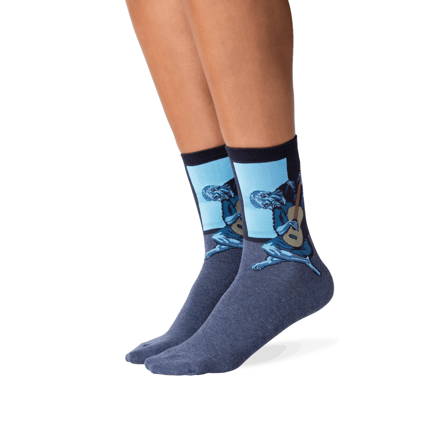 Lifestyle photo showing Picasso's Old Guitarist socks on a person's legs, showcasing how the socks look when worn.