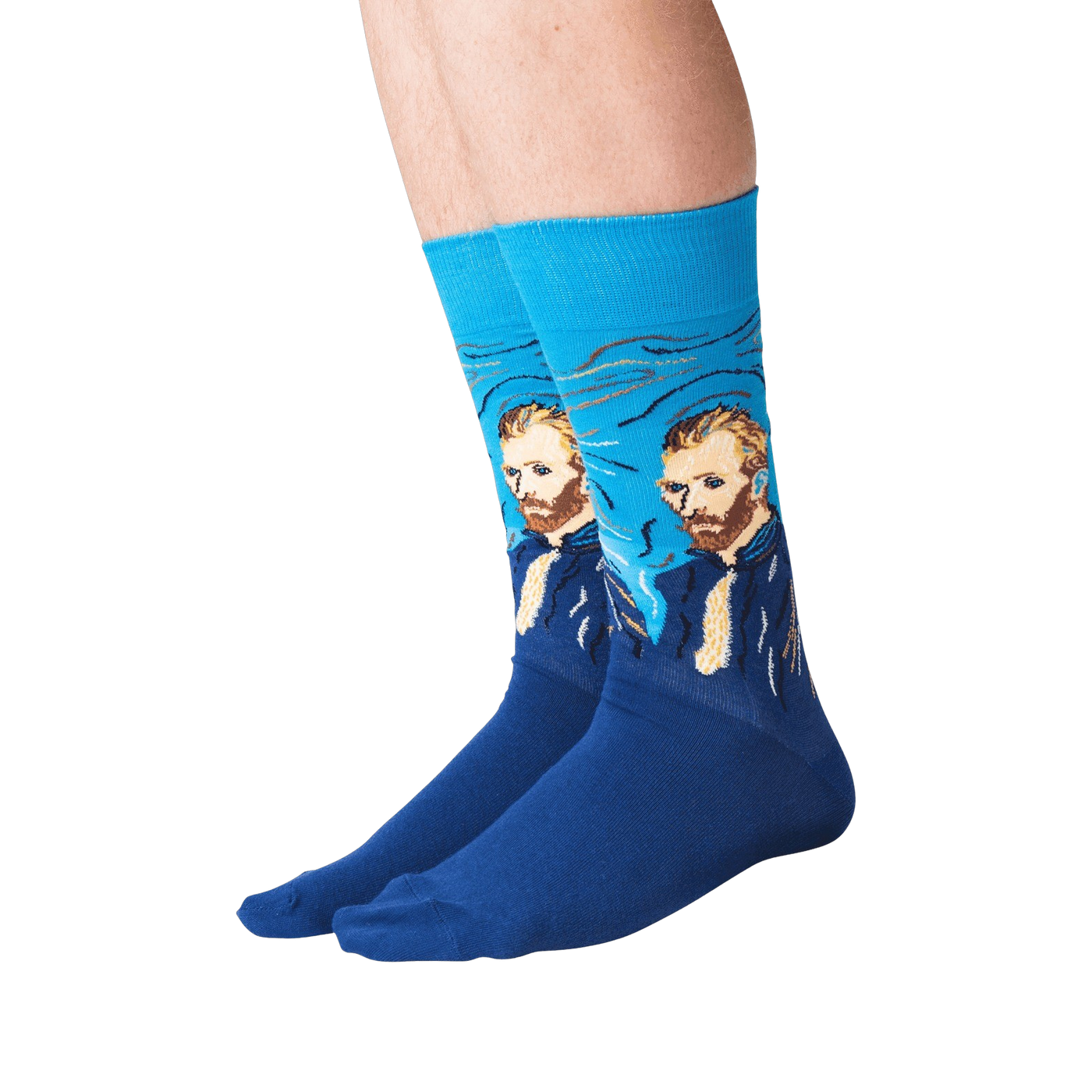 Lifestyle shot of a person wearing the Van Gogh's Self Portrait socks against a black background.