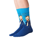 Lifestyle shot of a person wearing the Van Gogh's Self Portrait socks against a black background.
