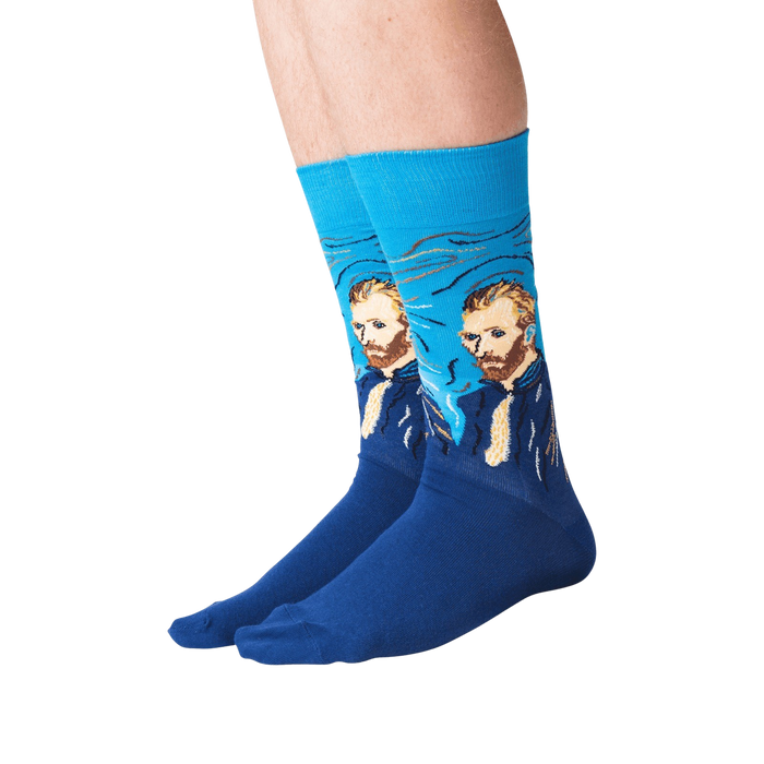 A pair of blue socks with a design of Vincent van Gogh's face on them.