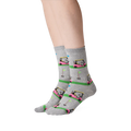 Lifestyle shot showing the Golf Cart socks on a person's legs, showcasing how the socks look when worn.