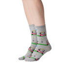 Lifestyle shot showing the Golf Cart socks on a person's legs, showcasing how the socks look when worn.