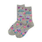 Pair of grey crew socks with a 'Happy Birthday' design. Features purple, pink, and blue pixelated cakes, balloons, and gifts.