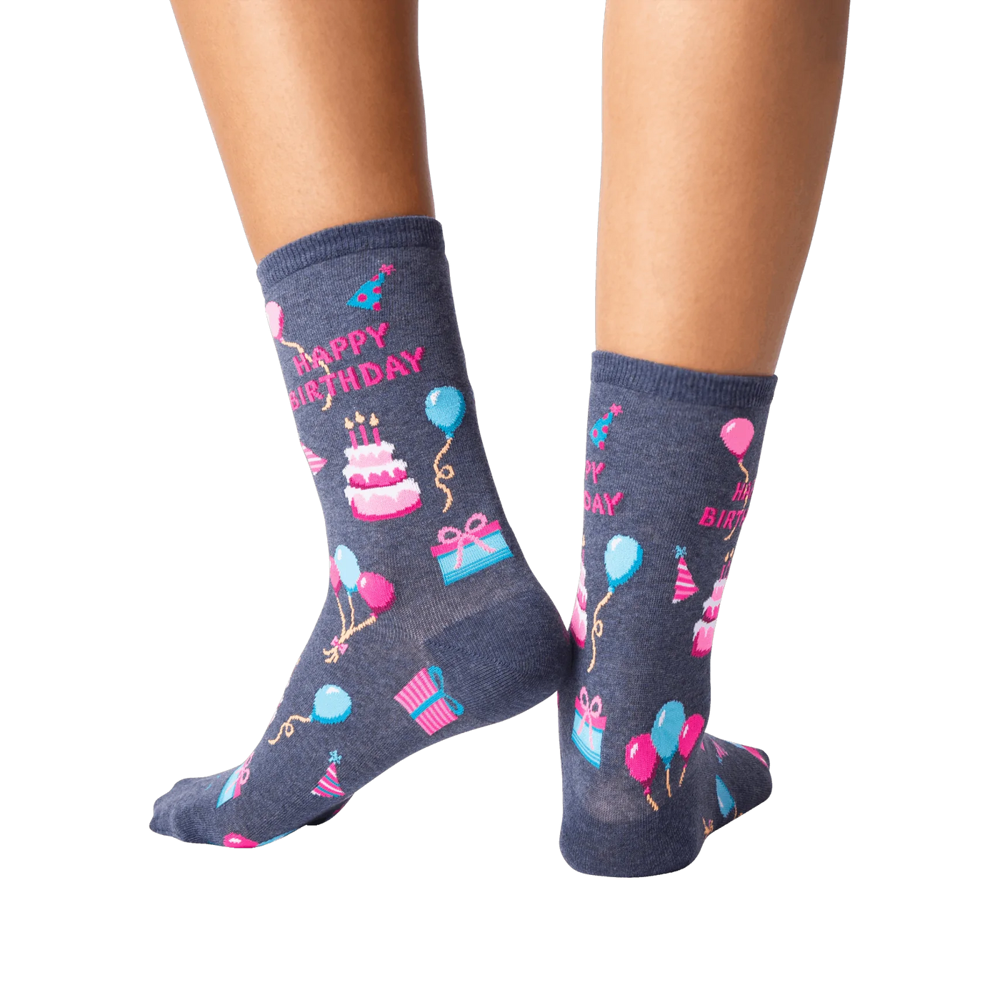 Flat lay showcasing all four colorways of the 'Happy Birthday' crew socks together. The socks are neatly arranged for easy viewing.