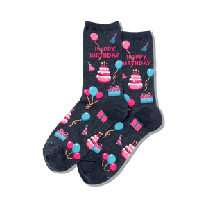  crew-length women's socks in dark blue with a lively pattern of colorful balloons, birthday cakes, wrapped gifts, and festive party hats.  
