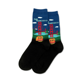 golden gate bridge socks in black with red and orange bridge pattern, cable cars, blue sky, and clouds. women's, crew length.    