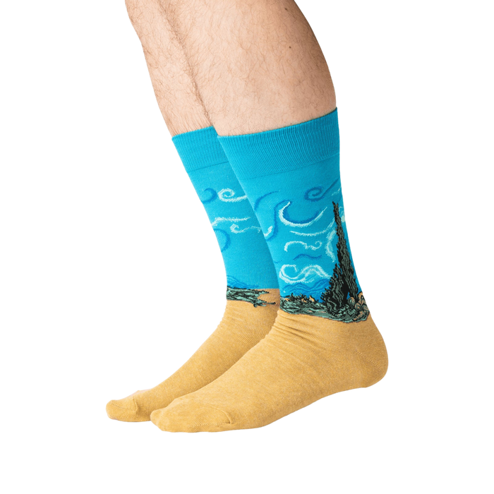 Lifestyle shot: A person's legs wearing the Van Gogh's Wheat Field with Cypress socks.