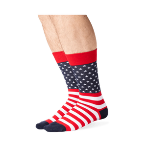 Lifestyle shot showing the American Flag socks on a person's legs. The socks are red, white and navy.
