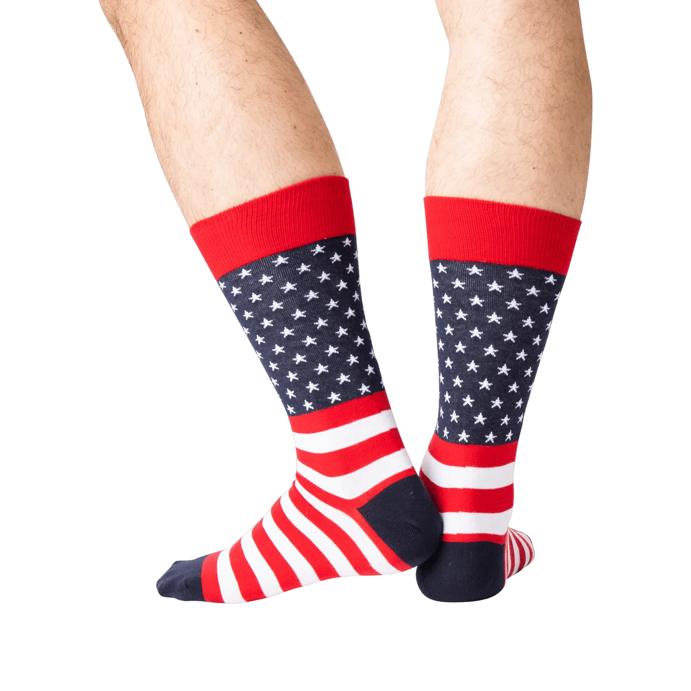 Rear view of the American Flag socks on a person's legs against a green background. The socks are red, white, and navy.