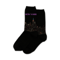 Pair of black crew socks with a detailed New York City skyline at night image and 'NEW YORK' written above it in purple.