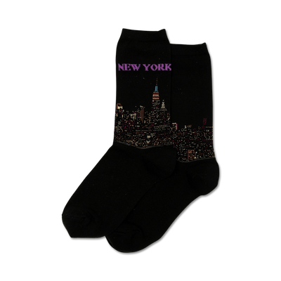 black women's crew socks with a vibrant pattern of the new york city skyline in bright colors.  