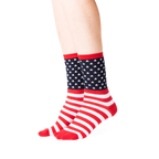 Lifestyle photo showing the American Flag socks on a person's feet.
