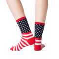 Back view of the American Flag socks on a person's feet.