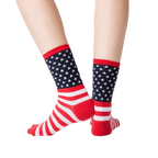 Back view of the American Flag socks on a person's feet.
