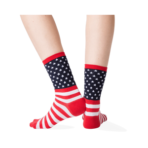 Back view of the American Flag socks on a person's feet.