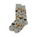 Pair of crew socks in light grey with repeating pattern of various dog breeds in brown and tan.