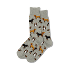 Pair of crew socks in light grey with repeating pattern of various dog breeds in brown and tan.