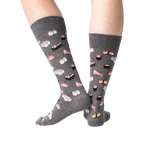 Studio shot of a pair of gray sushi socks from the back, showcasing the full print.